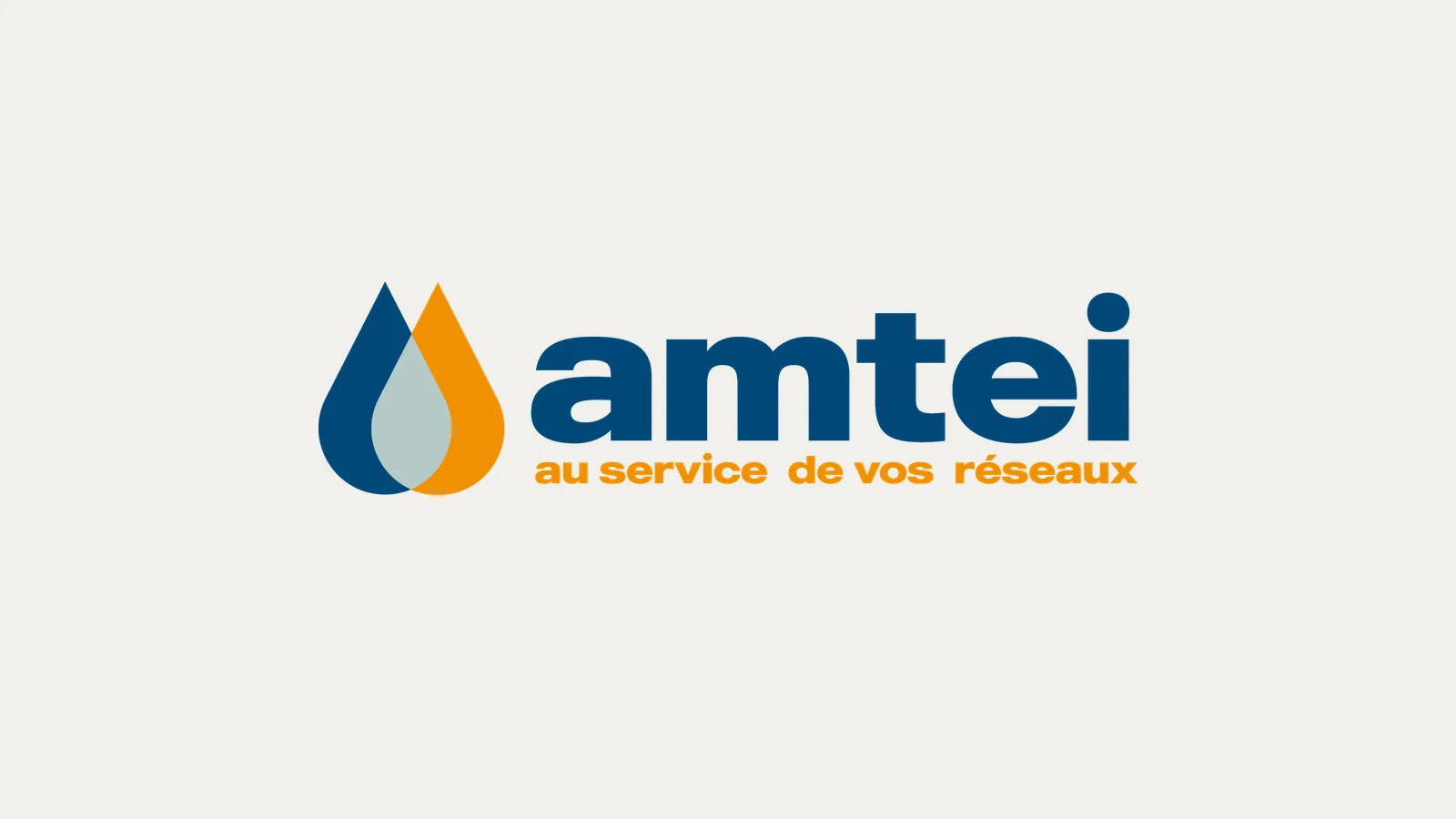 Logo AMTEI : goutte d'eau bleue et ambrée, signature « au service de vos réseaux »